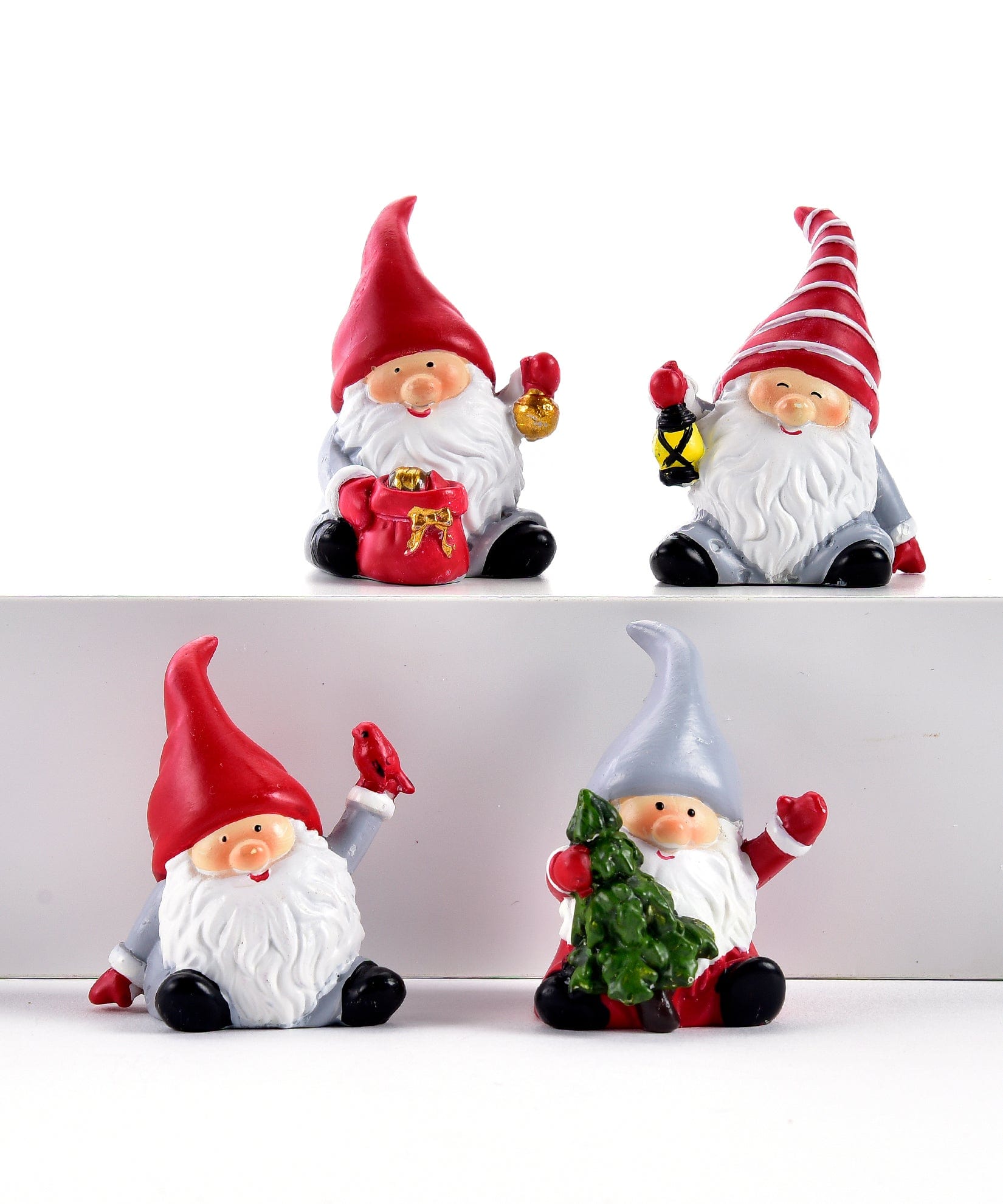 Seasonal & Holiday Decorations Sitting Gnome Figurines, 4 Assorted Designs